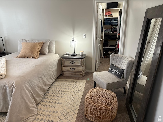 840 N Great View Dr E, Morgan, UT 84050 - carpeted bedroom featuring a walk in closet, a closet, and baseboards