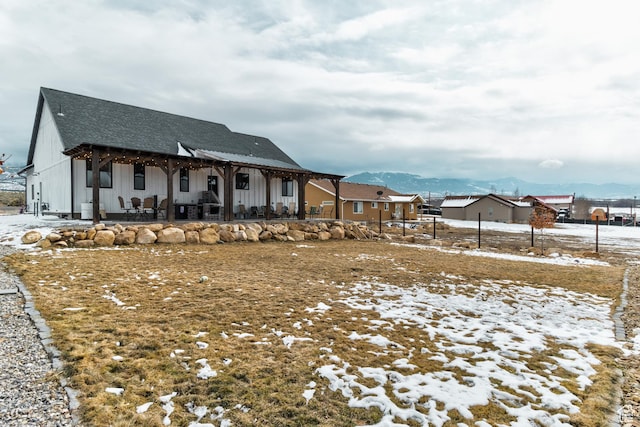720 S 700 E, Mount Pleasant, UT 84647 - snow covered property with a shingled roof, a patio area, and fence