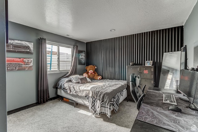 720 S 700 E, Mount Pleasant, UT 84647 - bedroom featuring carpet floors, a textured ceiling, and visible vents