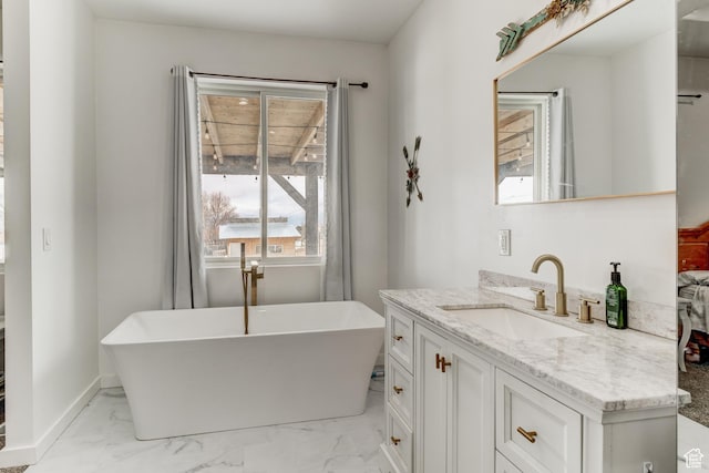720 S 700 E, Mount Pleasant, UT 84647 - bathroom featuring a freestanding bath, vanity, and marble finish floor