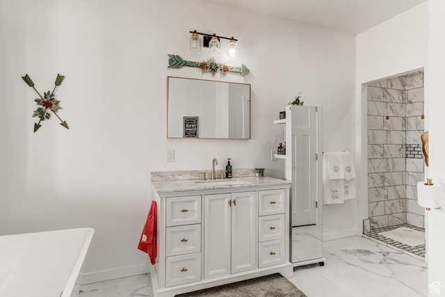 720 S 700 E, Mount Pleasant, UT 84647 - bathroom with a freestanding tub, baseboards, marble finish floor, and vanity