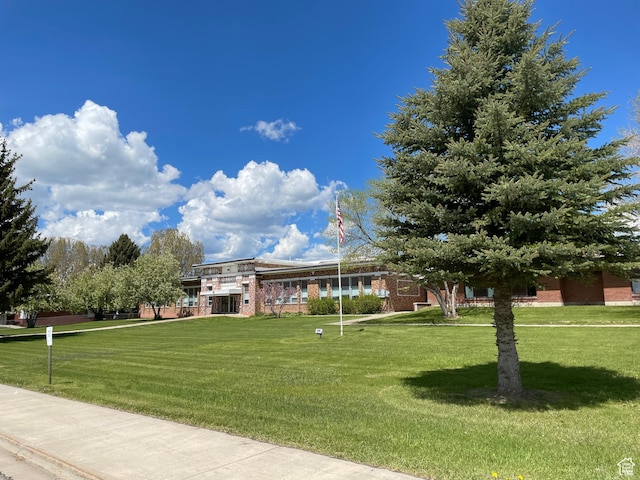 114 4th, Georgetown, ID 83239 - view of front facade featuring a front yard and brick siding