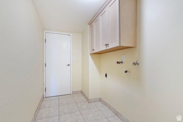 241 N Vine St Unit 1201E, Salt Lake City, UT 84103 - washroom featuring light tile patterned floors, cabinets, and hookup for an electric dryer