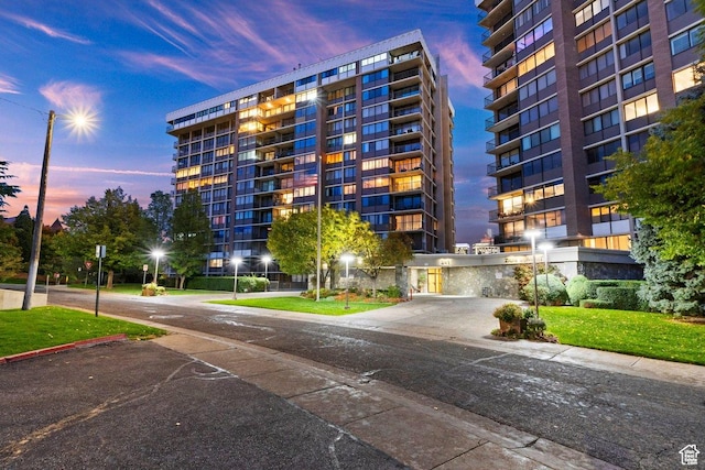 view of outdoor building at dusk