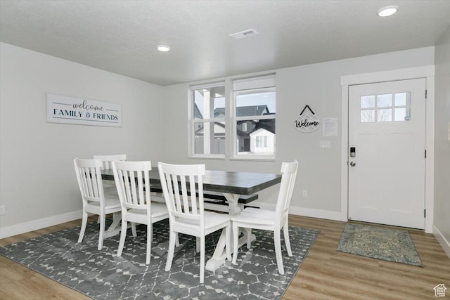 356 W Rendezvous Way, Garden City, UT 84028 - dining room featuring hardwood / wood-style flooring and a textured ceiling