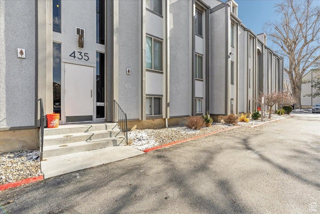 435 E Creekside Cir S Unit A, Salt Lake City, UT 84107 - doorway to property with stucco siding
