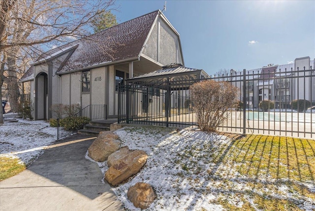 435 E Creekside Cir S Unit A, Salt Lake City, UT 84107 - view of front of house featuring a gazebo and stucco siding