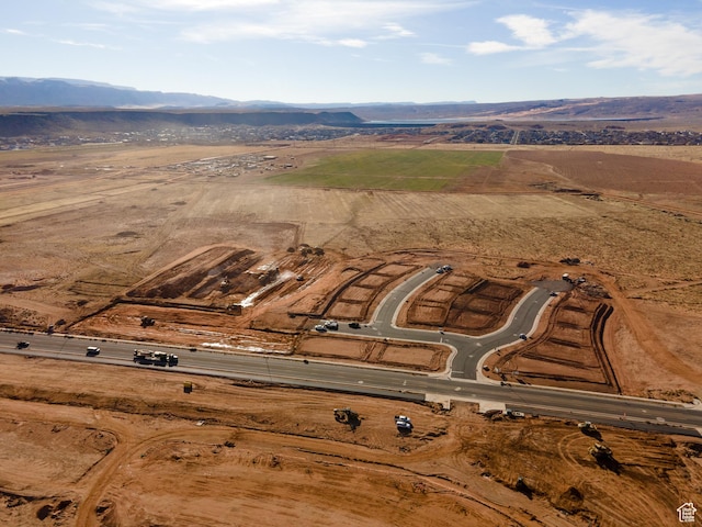 1589 S 4000 W Unit 12, Hurricane, UT 84737 - aerial overview of property's location with a mountainous background and rural landscape