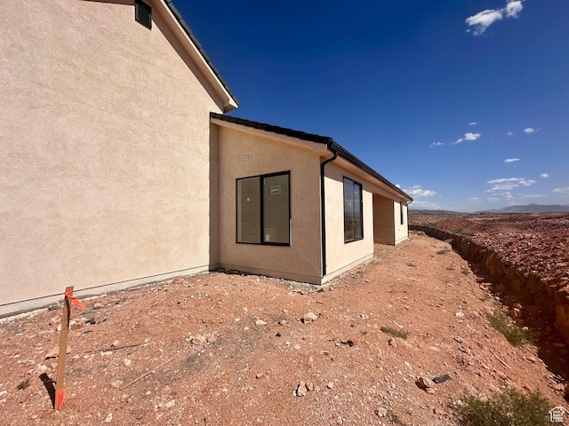 1589 S 4000 W Unit 12, Hurricane, UT 84737 - view of side of property featuring stucco siding