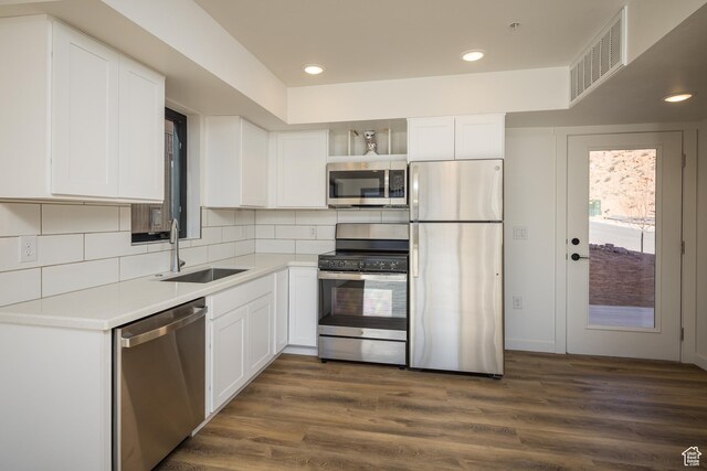 1185 S Murphy Ln Unit 201A, Moab, UT 84532 - kitchen featuring stainless steel appliances, a sink, open shelves, white cabinetry, and recessed lighting