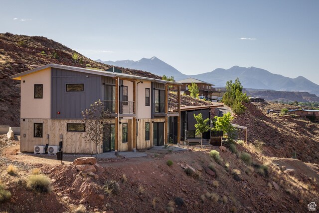 1185 S Murphy Ln Unit 201A, Moab, UT 84532 - back of property with a mountain view and a sunroom