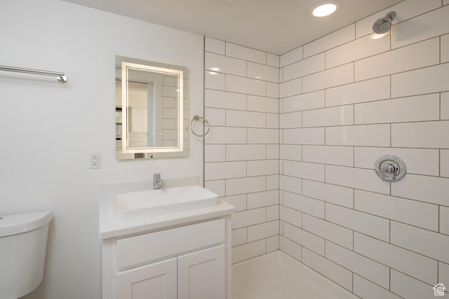 1185 S Murphy Ln Unit 201A, Moab, UT 84532 - bathroom with a tile shower, vanity, and toilet