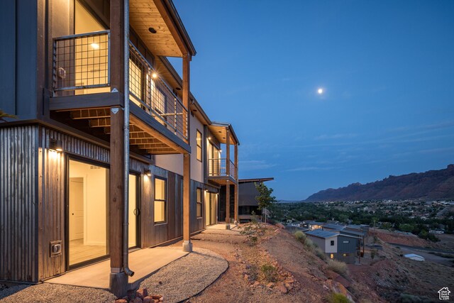 1185 S Murphy Ln Unit 201A, Moab, UT 84532 - view of property exterior featuring a balcony and a mountain view