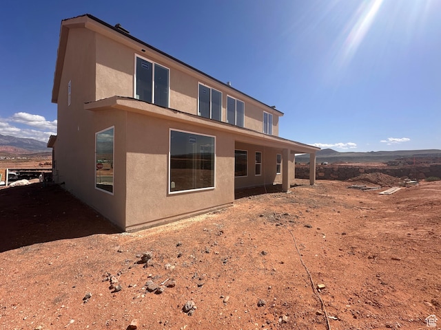 3997 W 1500 S, Hurricane, UT 84737 - back of property with stucco siding and a mountain view