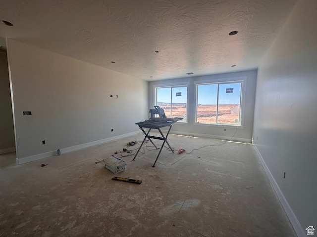 3997 W 1500 S, Hurricane, UT 84737 - unfurnished room with baseboards and a textured ceiling