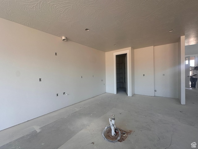 3997 W 1500 S, Hurricane, UT 84737 - unfurnished bedroom with a textured ceiling