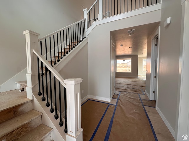 3997 W 1500 S, Hurricane, UT 84737 - stairs featuring baseboards and a high ceiling