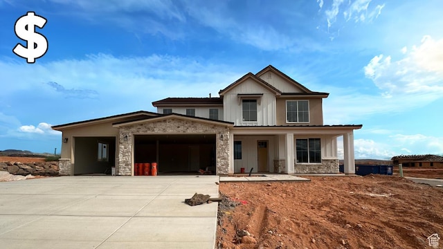 3997 W 1500 S, Hurricane, UT 84737 - modern farmhouse style home with stone siding, a garage, concrete driveway, and covered porch