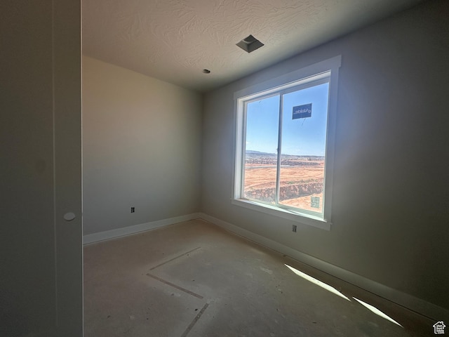 3997 W 1500 S, Hurricane, UT 84737 - unfurnished room featuring baseboards and a textured ceiling