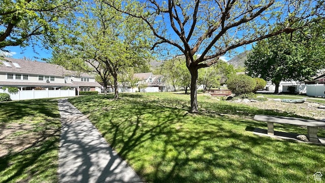 271 Brookfield Ln, Centerville, UT 84014 - surrounding community with fence, a yard, and a residential view