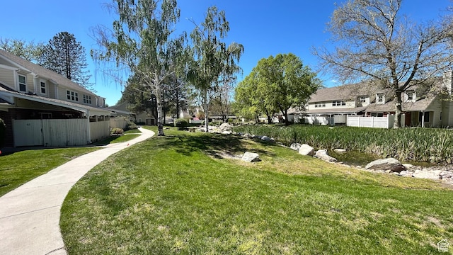 271 Brookfield Ln, Centerville, UT 84014 - surrounding community with fence and a yard