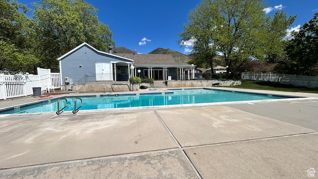 271 Brookfield Ln, Centerville, UT 84014 - view of pool featuring a fenced in pool, fence, and a patio