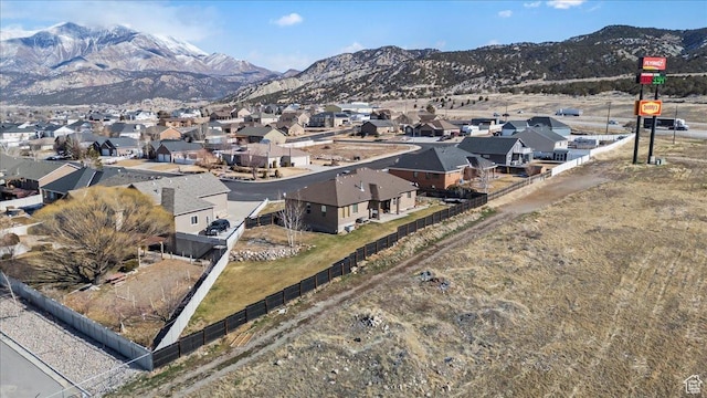 drone / aerial view featuring a mountain view