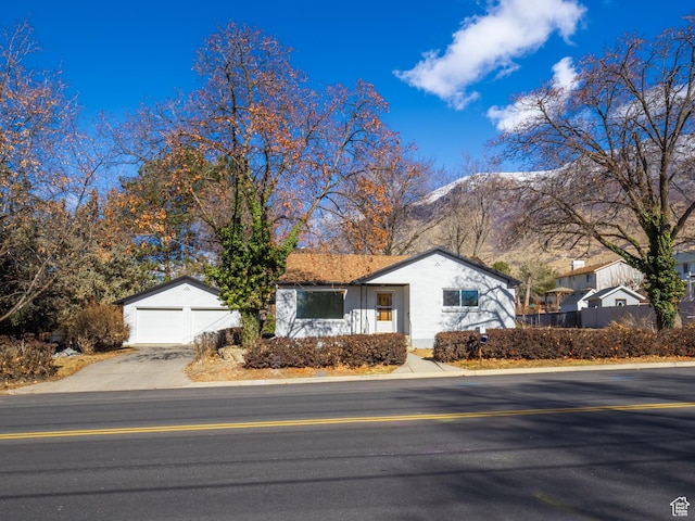 575 E 500 N, Pleasant Grove, UT 84062 - ranch-style home featuring a detached garage, a mountain view, and driveway