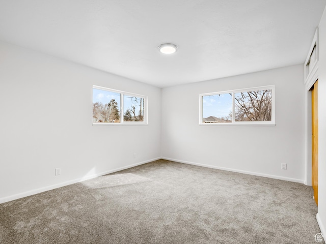 575 E 500 N, Pleasant Grove, UT 84062 - unfurnished bedroom featuring baseboards, carpet, and multiple windows