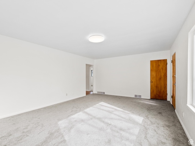 575 E 500 N, Pleasant Grove, UT 84062 - spare room featuring baseboards, visible vents, and carpet