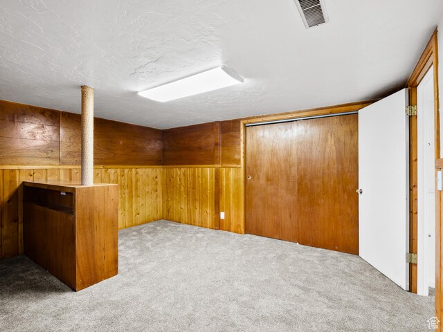 575 E 500 N, Pleasant Grove, UT 84062 - finished below grade area featuring visible vents, wood walls, and carpet flooring
