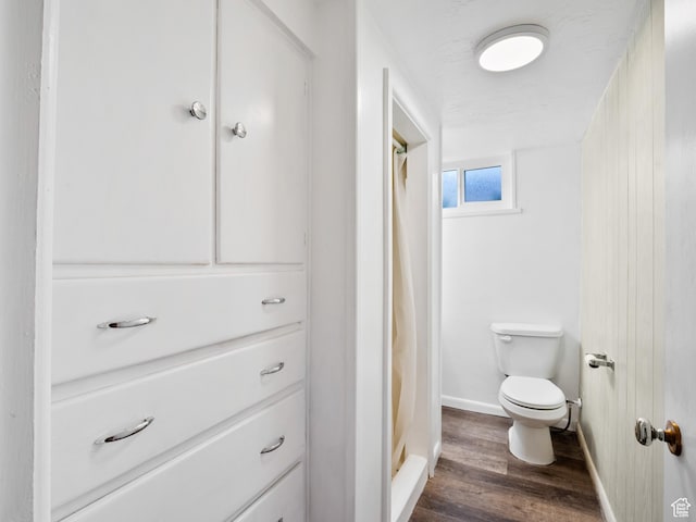 575 E 500 N, Pleasant Grove, UT 84062 - full bath featuring curtained shower, wood finished floors, toilet, and baseboards