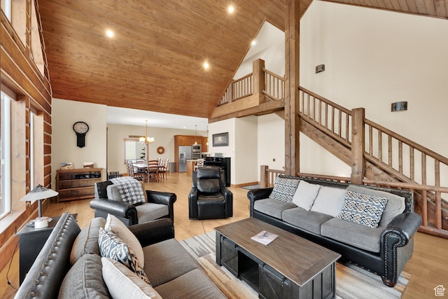 9284 E Tree Top Cir Unit 856, Heber City, UT 84032 - living area with high vaulted ceiling, wooden ceiling, light wood finished floors, a chandelier, and stairs