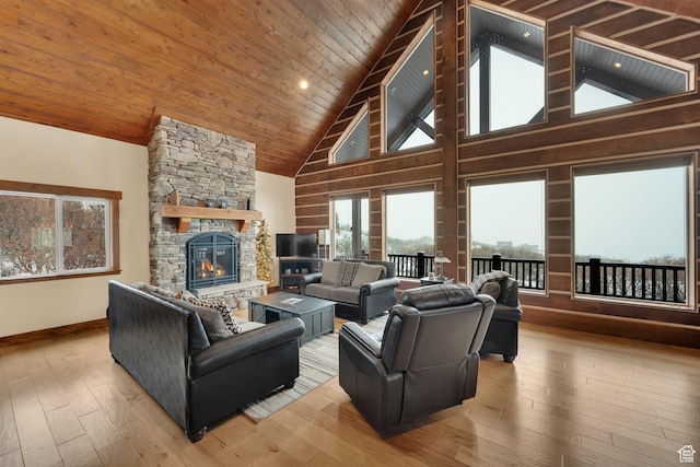 9284 E Tree Top Cir Unit 856, Heber City, UT 84032 - living room featuring baseboards, high vaulted ceiling, a stone fireplace, hardwood / wood-style flooring, and wooden ceiling