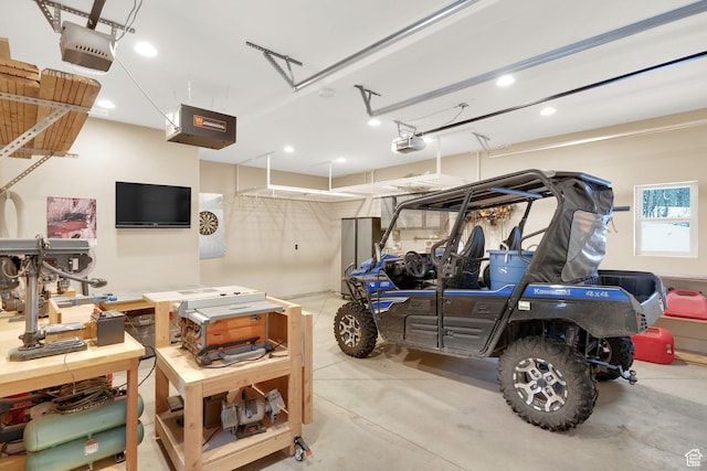 9284 E Tree Top Cir Unit 856, Heber City, UT 84032 - garage with a garage door opener and recessed lighting