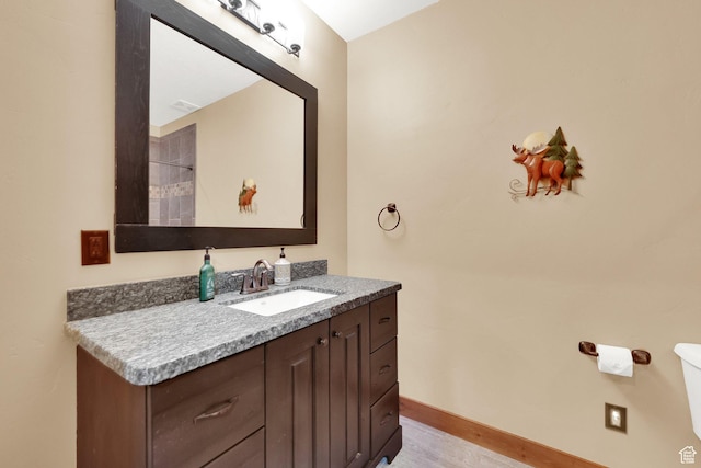 9284 E Tree Top Cir Unit 856, Heber City, UT 84032 - full bath with vanity, toilet, a shower with shower curtain, wood finished floors, and baseboards