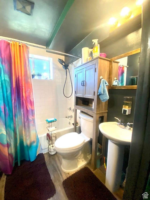 289 E 400 N, Parowan, UT 84761 - full bathroom with sink, toilet, hardwood / wood-style floors, and shower / bath combo with shower curtain