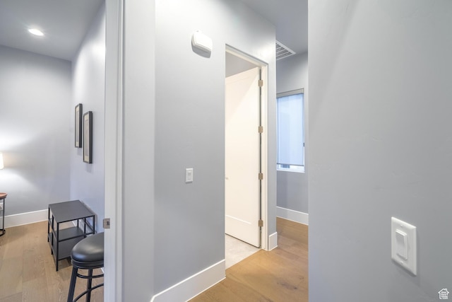 hall featuring light hardwood / wood-style flooring
