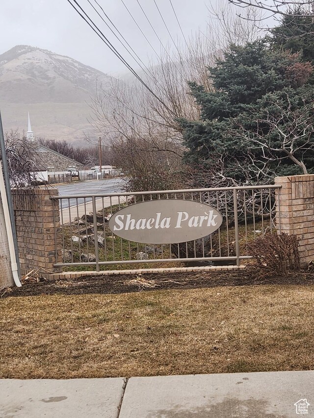 548 S 675 W, Centerville, UT 84014 - exterior space featuring a mountain view and a yard