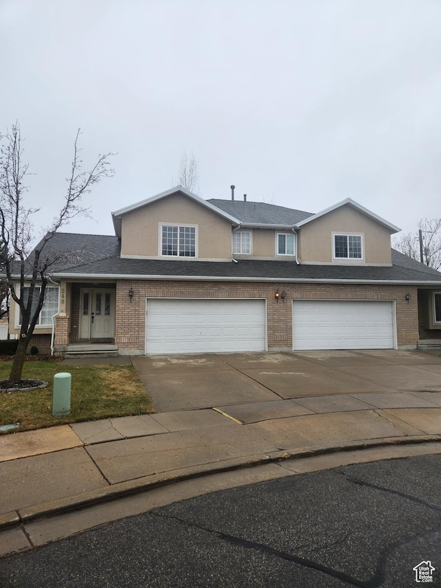 front of property featuring a garage
