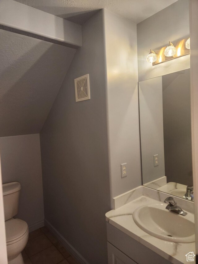 548 S 675 W, Centerville, UT 84014 - bathroom featuring vanity, tile patterned floors, and toilet