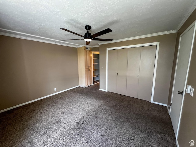 1080 E Quail Park Dr Unit J, Millcreek, UT 84117 - unfurnished bedroom with baseboards, a closet, crown molding, dark carpet, and ceiling fan