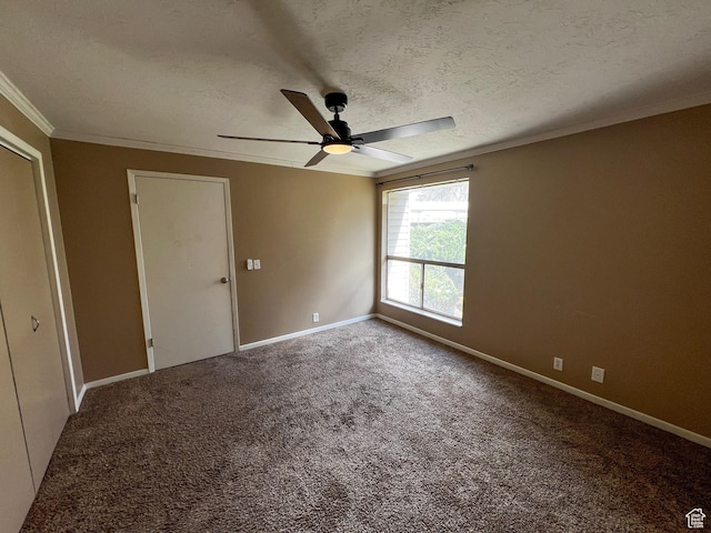 1080 E Quail Park Dr Unit J, Millcreek, UT 84117 - spare room with baseboards, a ceiling fan, a textured ceiling, crown molding, and carpet floors