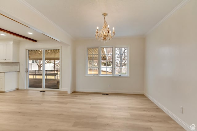 1503 N 1980 W, Provo, UT 84604 - unfurnished dining area with a chandelier, plenty of natural light, light wood-type flooring, ornamental molding, and baseboards