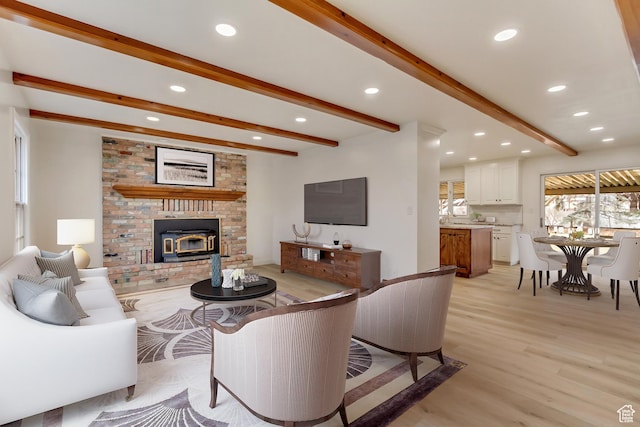 1503 N 1980 W, Provo, UT 84604 - living room featuring beam ceiling, recessed lighting, light wood-style floors, and a brick fireplace