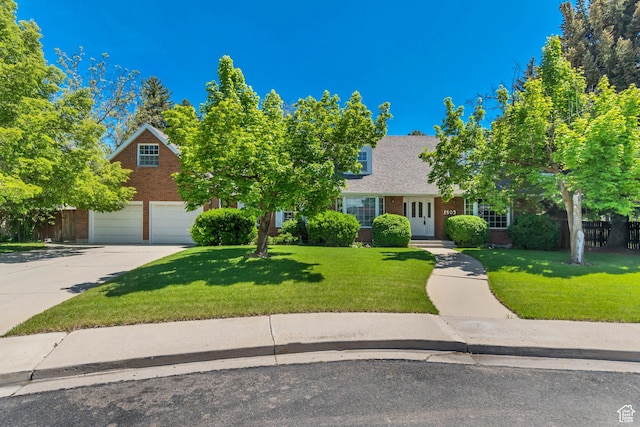 1503 N 1980 W, Provo, UT 84604 - view of front of property with brick siding, driveway, and a garage