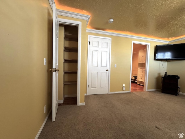 500 W Clark St S, Grantsville, UT 84029 - unfurnished bedroom featuring a textured ceiling, carpet, baseboards, ensuite bathroom, and ornamental molding