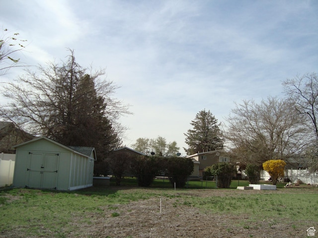 500 W Clark St S, Grantsville, UT 84029 - view of yard with an outdoor structure, fence, and a shed