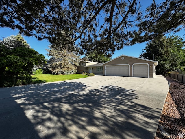 500 W Clark St S, Grantsville, UT 84029 - view of front of property with concrete driveway and a garage