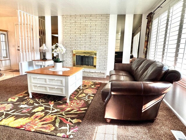 500 W Clark St S, Grantsville, UT 84029 - living room featuring baseboards, visible vents, and a fireplace